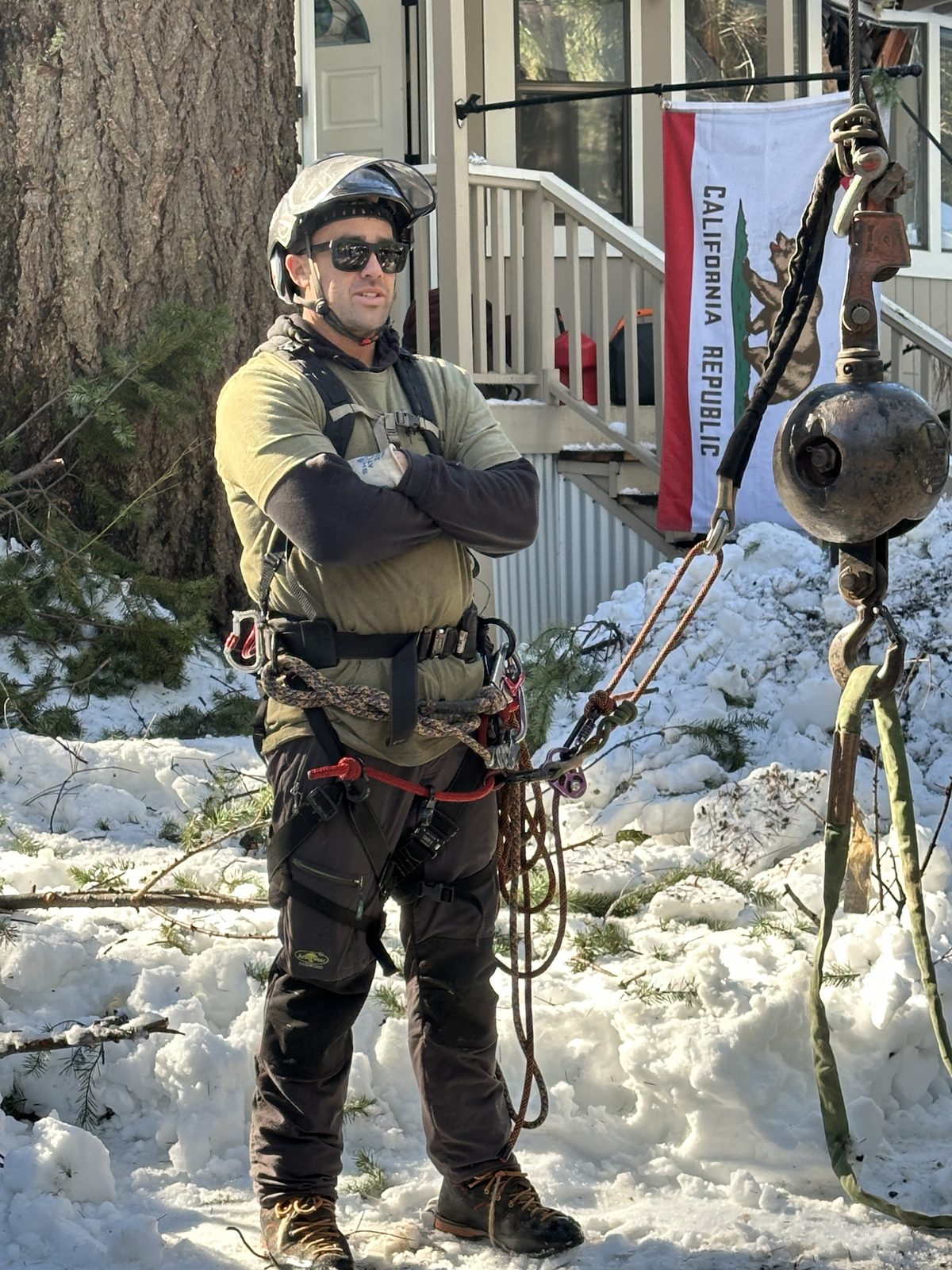 David Powell operating crane during storm cleanup